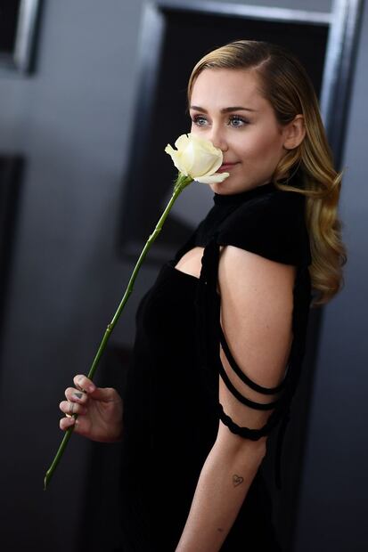 Ellos portaron una rosa blanca por #MeToo en los Grammy