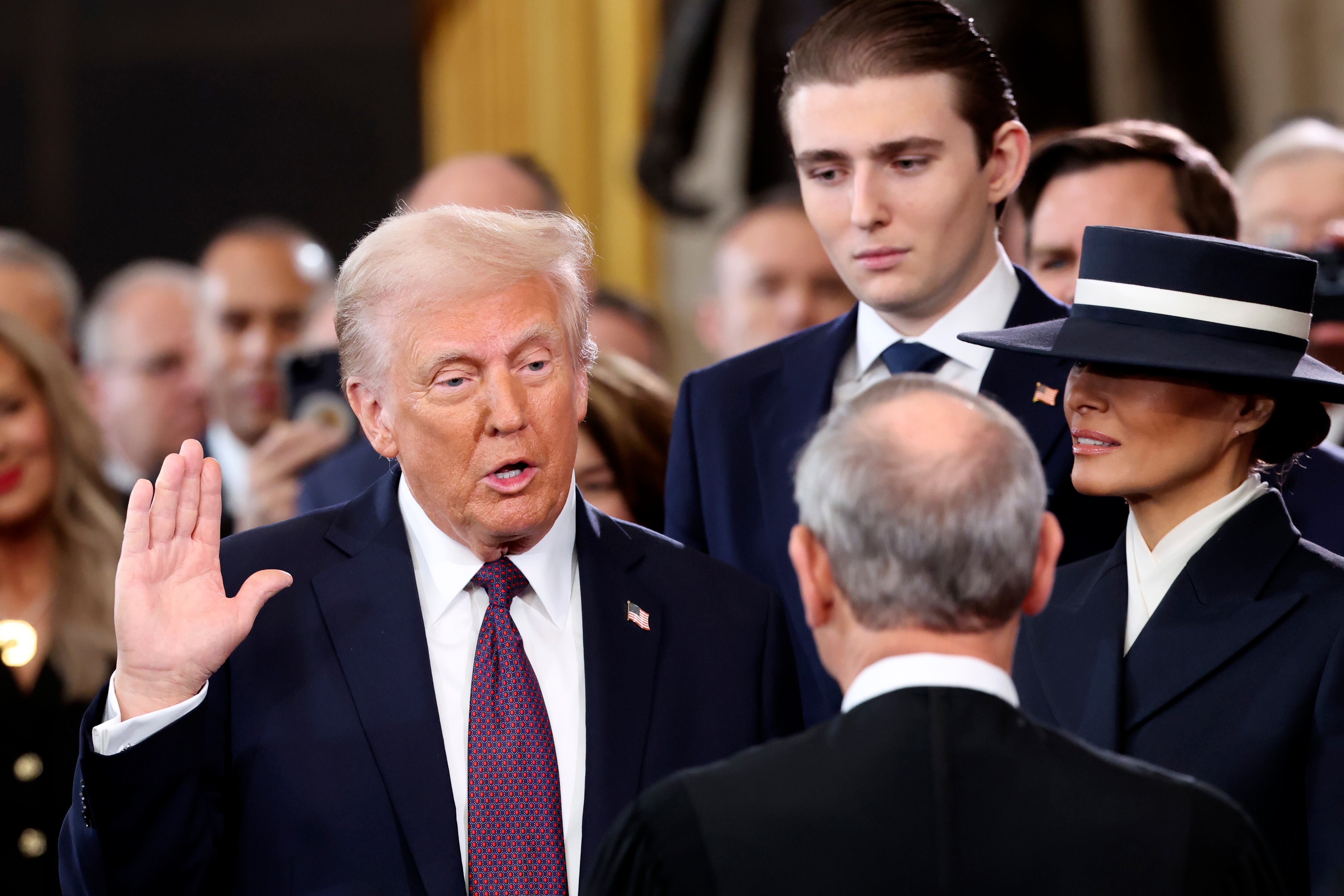 Donald, Barron y Melania Trump / Foto: AP