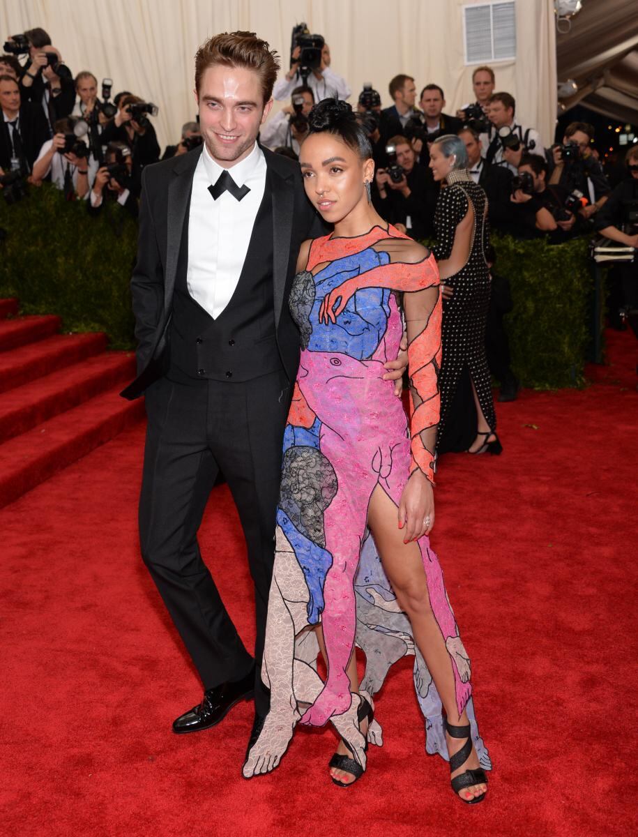 Famosos guapos con parejas poco agraciadas 