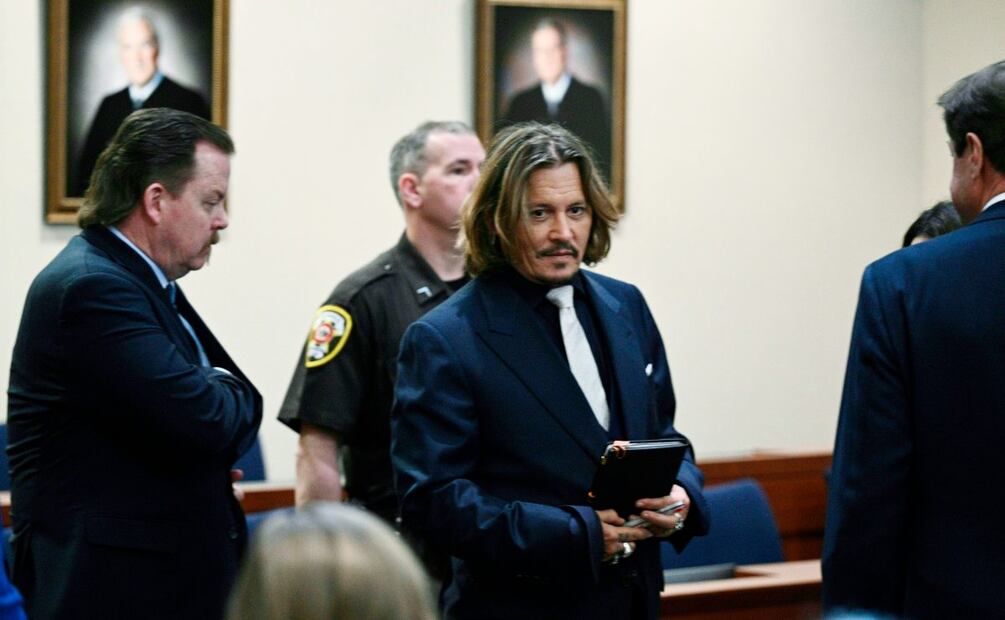 Johnny Depp y Amber Heard: Ella publicará fotos inéditas de los golpes que él le dió