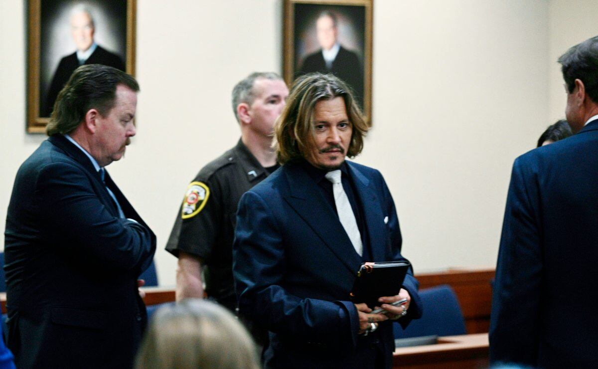 Johnny Depp y Amber Heard: Ella publicará fotos inéditas de los golpes que él le dió
