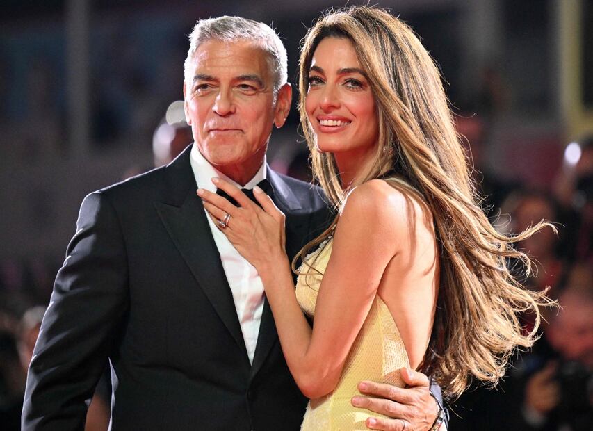 Amal junto a George Clooney / Foto: AFP