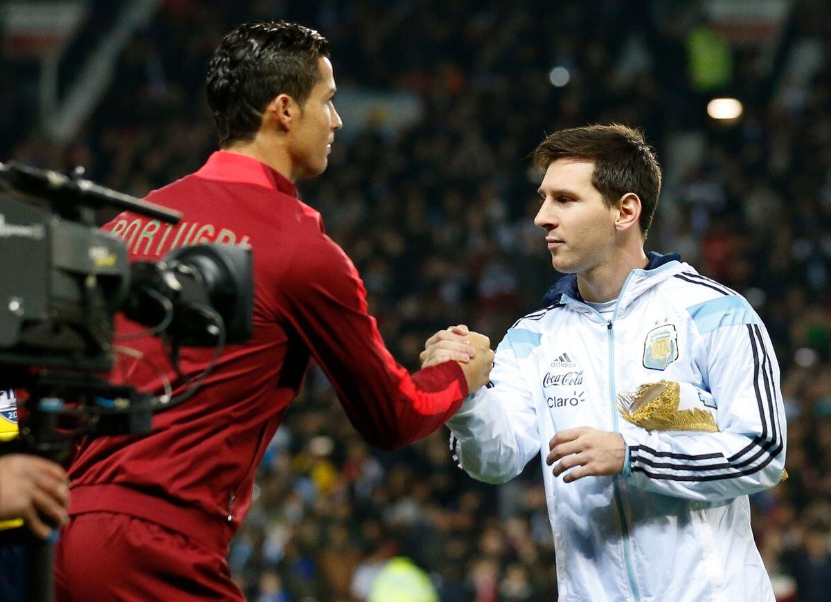 Cristiano Ronaldo y Messi (Foto: AP)
