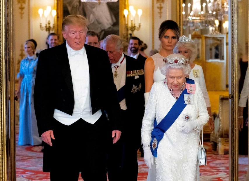 Isabel II junto a Donald Trump y Melania Trump / Foto: AFP