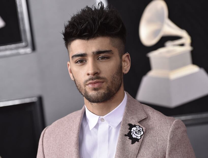 Ellos portaron una rosa blanca por #MeToo en los Grammy