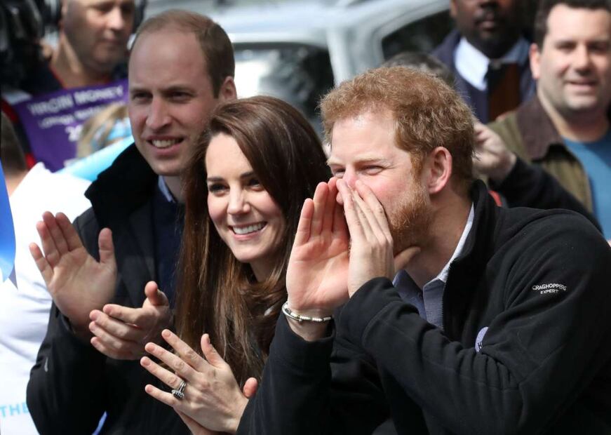El príncipe William, Kate Middleton y el príncipe Harry / AFP